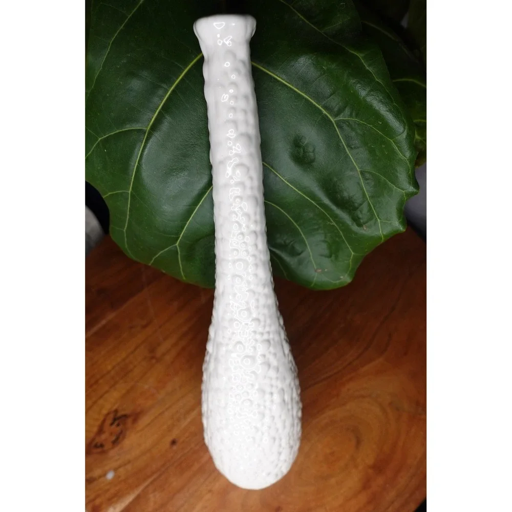White vase with long neck and‎ gourd like ribbed textured